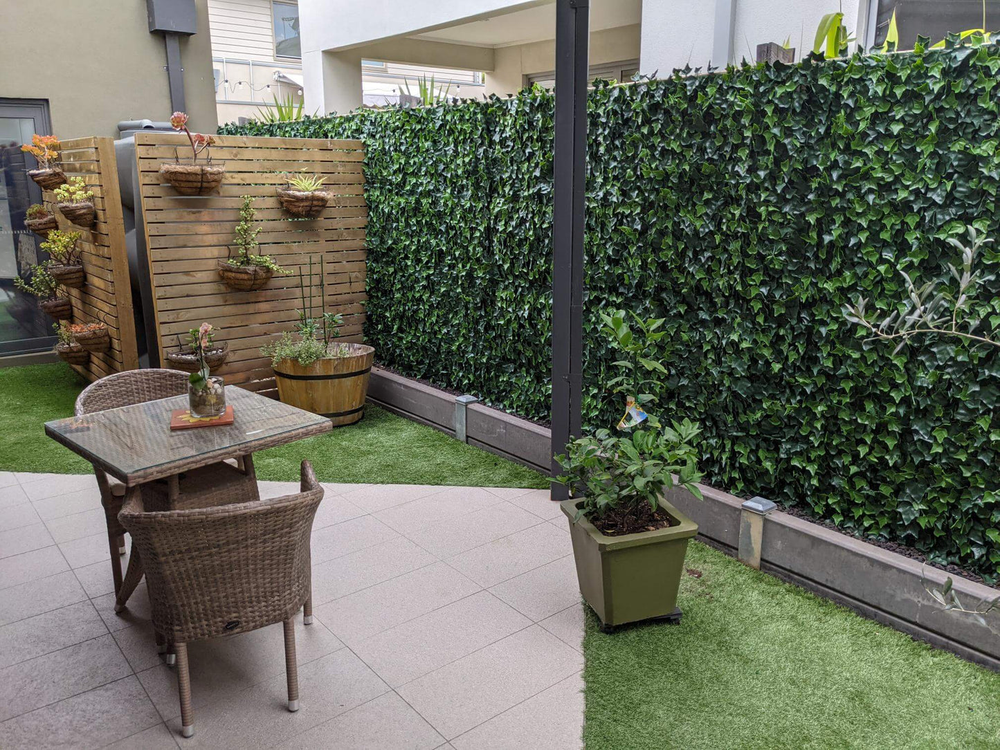 Artificial Ivy Panels onto a fence