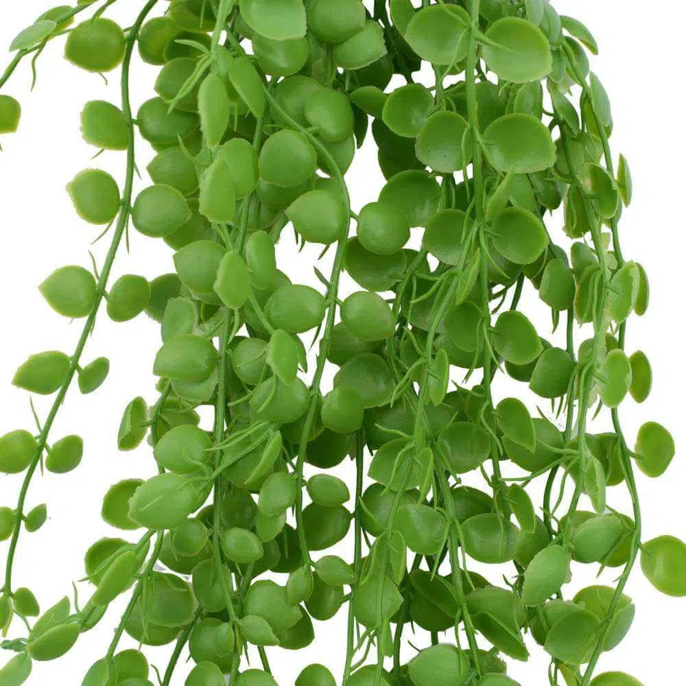 Close-up of dense artificial green foliage.