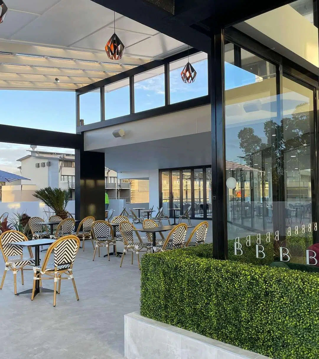 Artificial Boxwood Hedge Installed in Miami Cafe