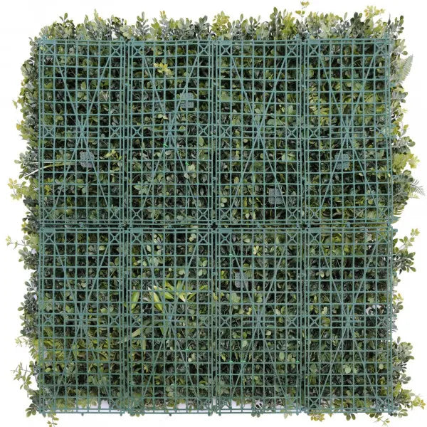 backing of faux fern plant wall panel